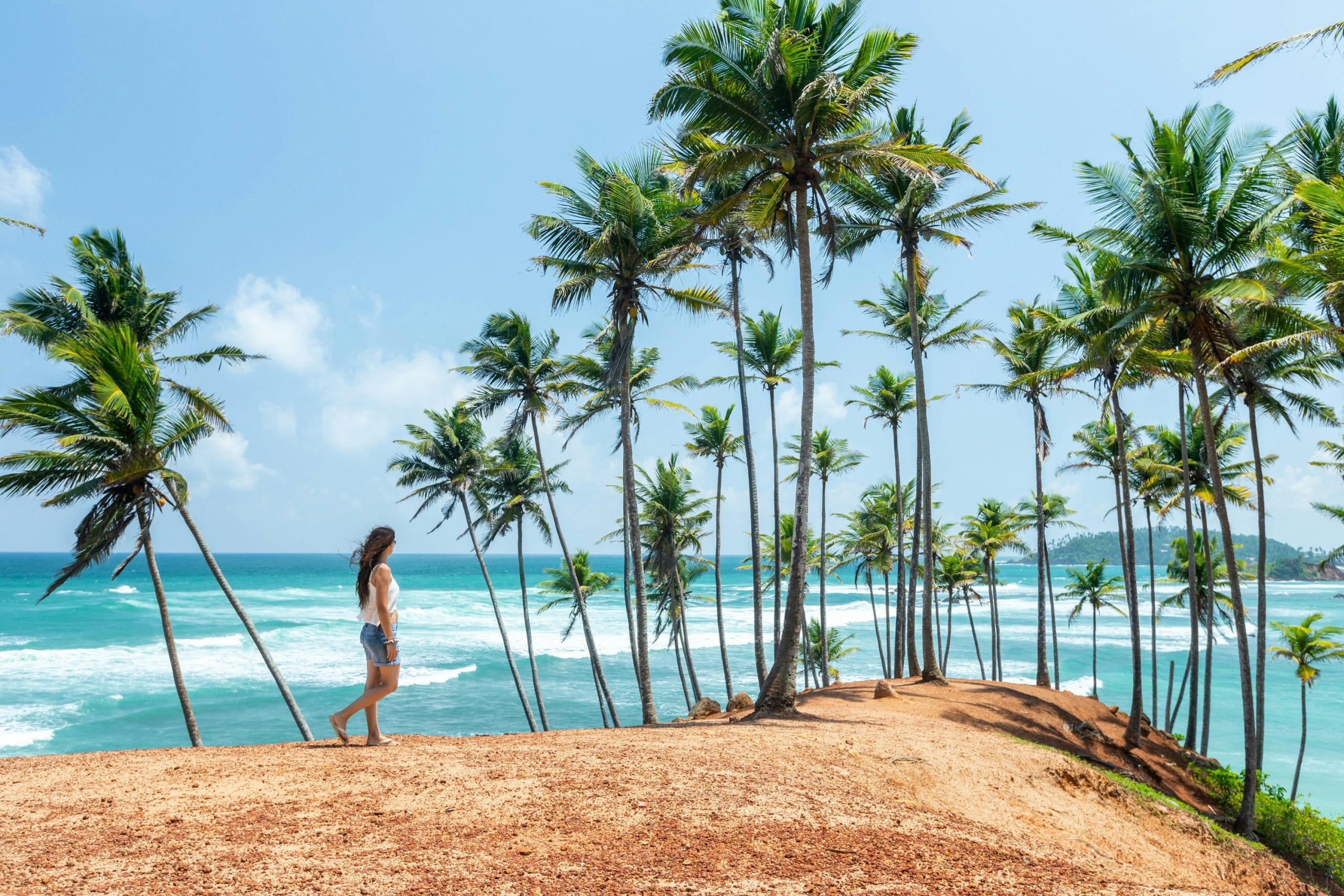 Girl walking in Beach Sri Lanka